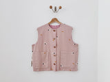 reversible vest • chaleco reversible barritas