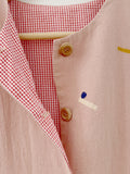 reversible vest • chaleco reversible barritas