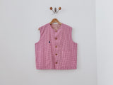 reversible vest • chaleco reversible barritas