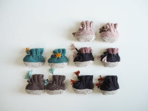 knitted booties with cord